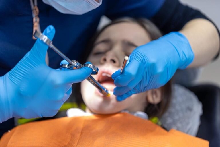 Child undergoing tooth extraction treatment at dental clinic in Ghaziabad