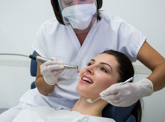 Patient undergoing professional teeth reshaping procedure at the Best Teeth Reshaping Treatment in Shastri Nagar.