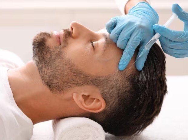 Patient receiving a hair transplant procedure by the Best Hair Transplant Surgeon in Shastri Nagar